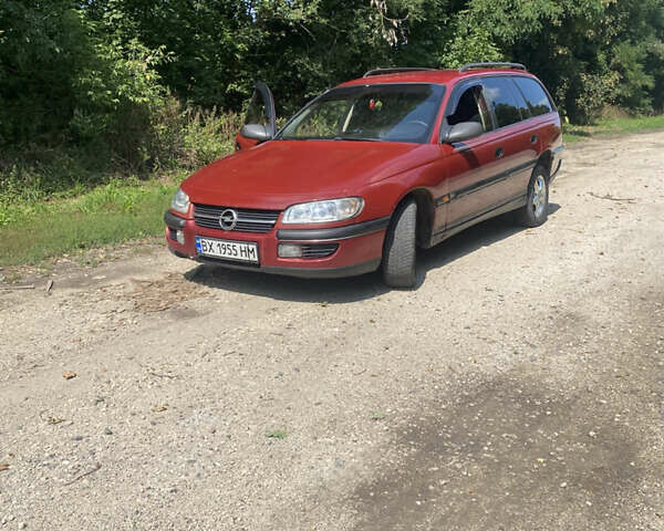Красный Опель Омега, объемом двигателя 2.5 л и пробегом 200 тыс. км за 1800 $, фото 1 на Automoto.ua