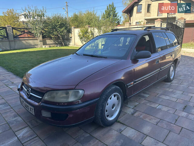 Красный Опель Омега, объемом двигателя 2 л и пробегом 310 тыс. км за 1200 $, фото 1 на Automoto.ua
