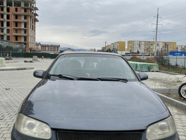 Серый Опель Омега, объемом двигателя 2 л и пробегом 300 тыс. км за 1400 $, фото 1 на Automoto.ua