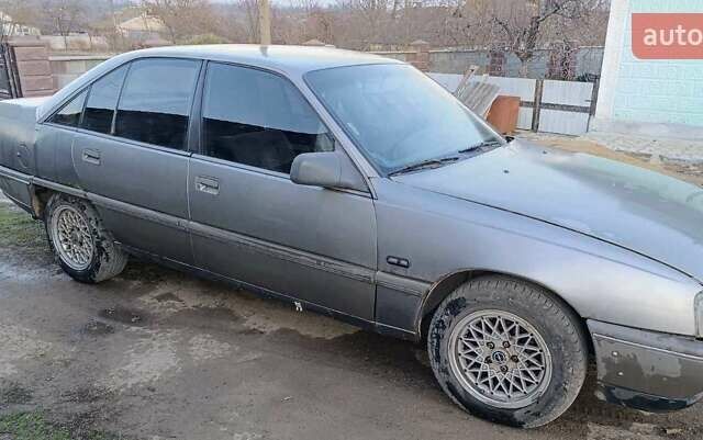 Серый Опель Омега, объемом двигателя 2 л и пробегом 250 тыс. км за 600 $, фото 1 на Automoto.ua