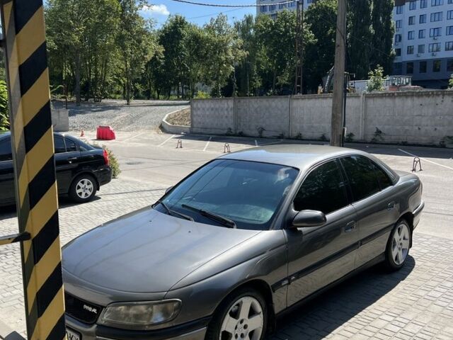 Серый Опель Омега, объемом двигателя 2 л и пробегом 248 тыс. км за 2600 $, фото 1 на Automoto.ua