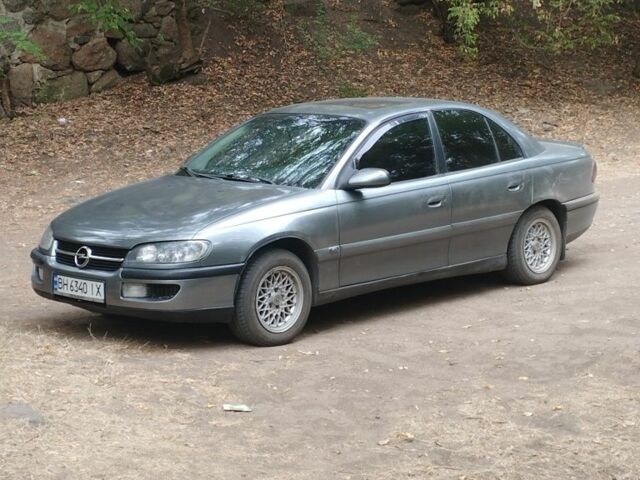 Сірий Опель Омега, об'ємом двигуна 2 л та пробігом 3 тис. км за 2500 $, фото 1 на Automoto.ua
