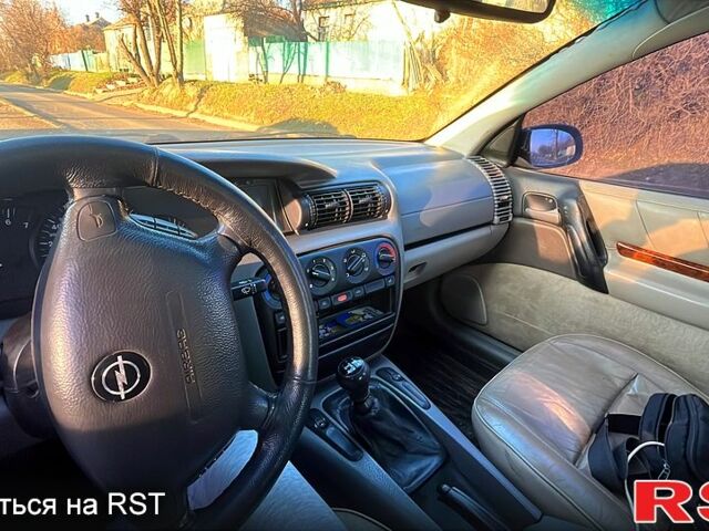 Серый Опель Омега, объемом двигателя 2 л и пробегом 390 тыс. км за 1000 $, фото 1 на Automoto.ua