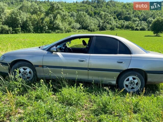 Серый Опель Омега, объемом двигателя 3 л и пробегом 255 тыс. км за 1300 $, фото 1 на Automoto.ua