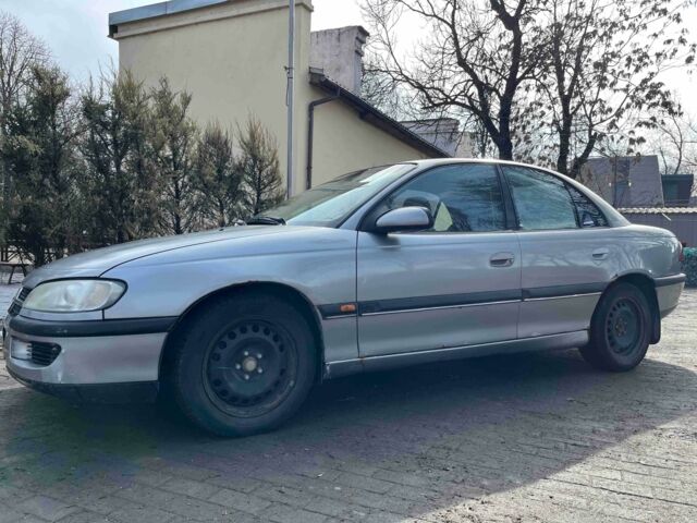 Серый Опель Омега, объемом двигателя 2 л и пробегом 365 тыс. км за 1800 $, фото 1 на Automoto.ua