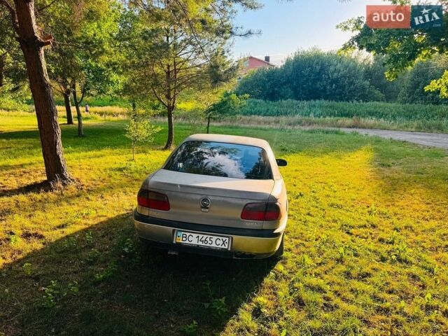Сірий Опель Омега, об'ємом двигуна 2 л та пробігом 450 тис. км за 1300 $, фото 1 на Automoto.ua