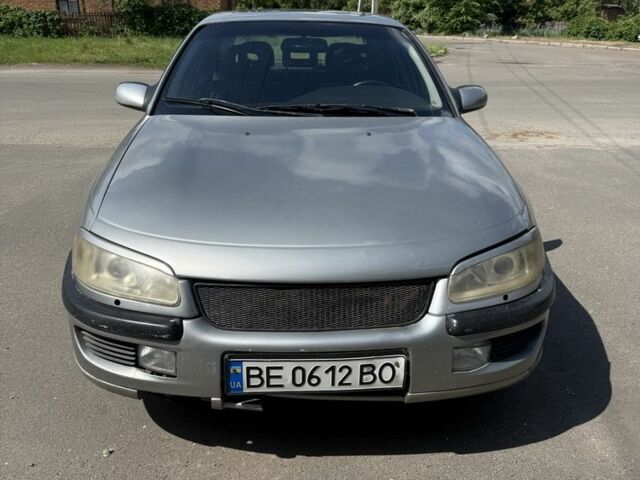 Серый Опель Омега, объемом двигателя 3 л и пробегом 426 тыс. км за 2500 $, фото 1 на Automoto.ua