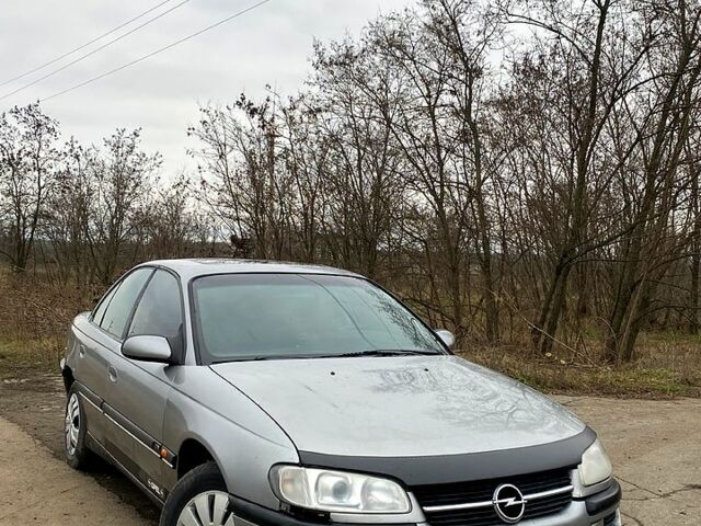 Сірий Опель Омега, об'ємом двигуна 2 л та пробігом 0 тис. км за 1600 $, фото 1 на Automoto.ua