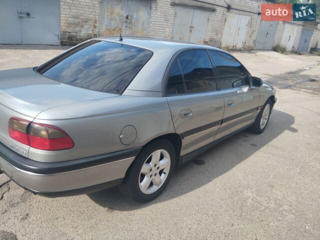 Сірий Опель Омега, об'ємом двигуна 2 л та пробігом 257 тис. км за 4100 $, фото 1 на Automoto.ua