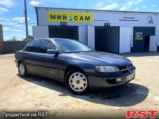 Серый Опель Омега, объемом двигателя 2 л и пробегом 250 тыс. км за 1700 $, фото 1 на Automoto.ua