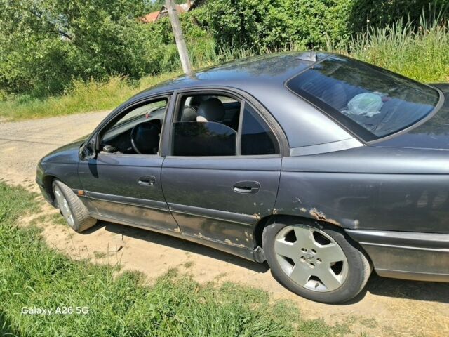 Сірий Опель Омега, об'ємом двигуна 2 л та пробігом 368 тис. км за 1350 $, фото 1 на Automoto.ua