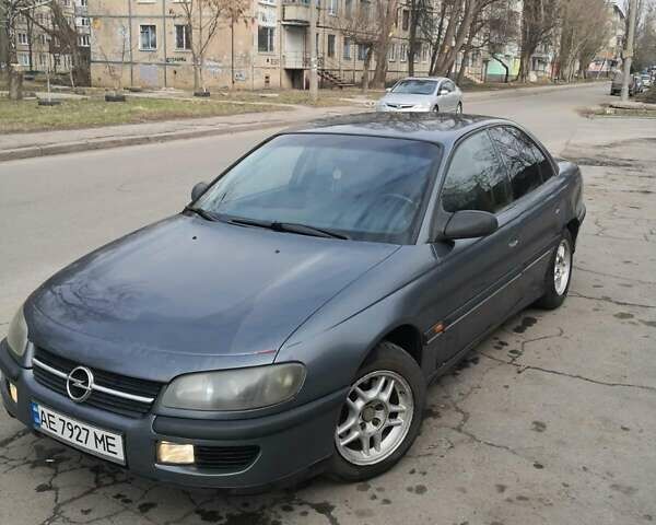 Серый Опель Омега, объемом двигателя 2 л и пробегом 401 тыс. км за 2300 $, фото 1 на Automoto.ua