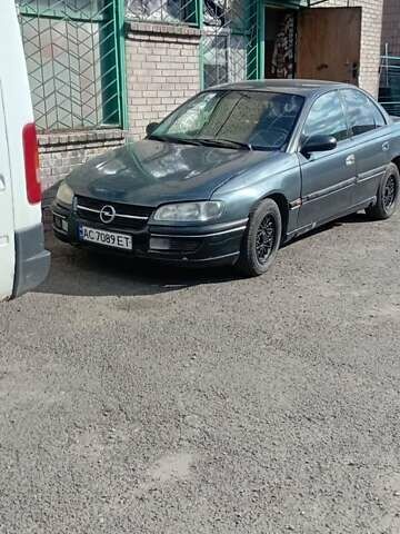 Сірий Опель Омега, об'ємом двигуна 2 л та пробігом 390 тис. км за 1200 $, фото 1 на Automoto.ua