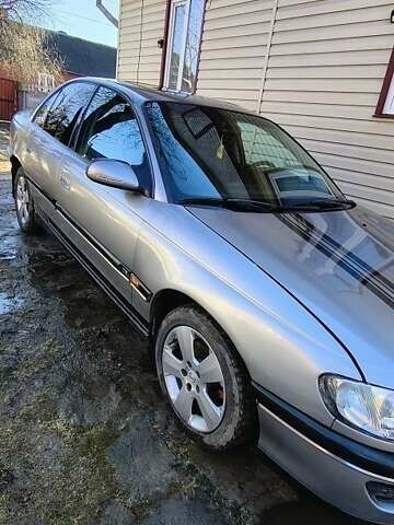 Серый Опель Омега, объемом двигателя 2 л и пробегом 400 тыс. км за 1900 $, фото 1 на Automoto.ua