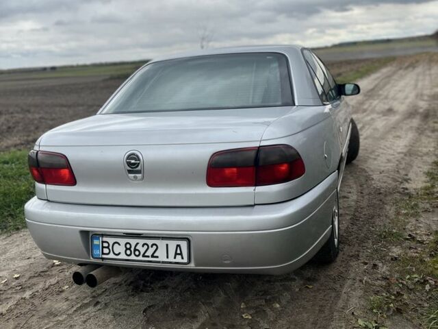 Серый Опель Омега, объемом двигателя 2.5 л и пробегом 300 тыс. км за 1500 $, фото 1 на Automoto.ua