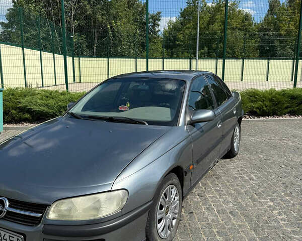Серый Опель Омега, объемом двигателя 2 л и пробегом 318 тыс. км за 2200 $, фото 1 на Automoto.ua
