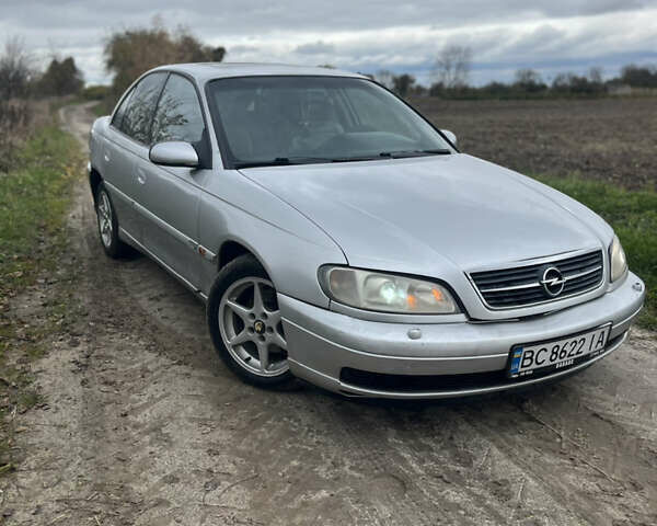 Серый Опель Омега, объемом двигателя 2.5 л и пробегом 300 тыс. км за 1600 $, фото 1 на Automoto.ua