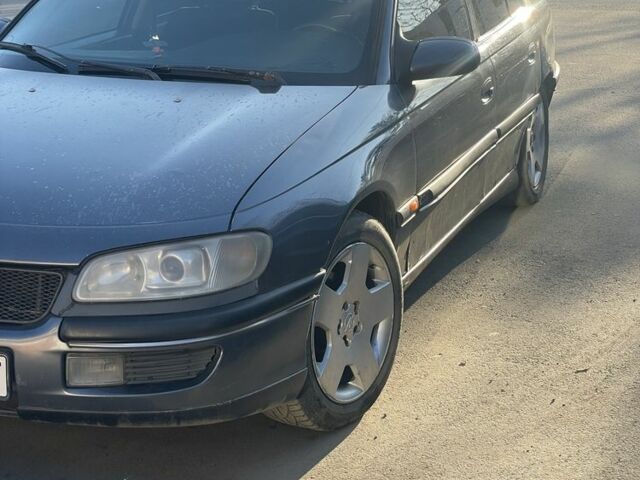 Серый Опель Омега, объемом двигателя 2 л и пробегом 350 тыс. км за 1800 $, фото 1 на Automoto.ua