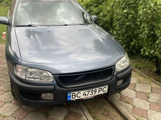 Сірий Опель Омега, об'ємом двигуна 2 л та пробігом 316 тис. км за 1400 $, фото 1 на Automoto.ua