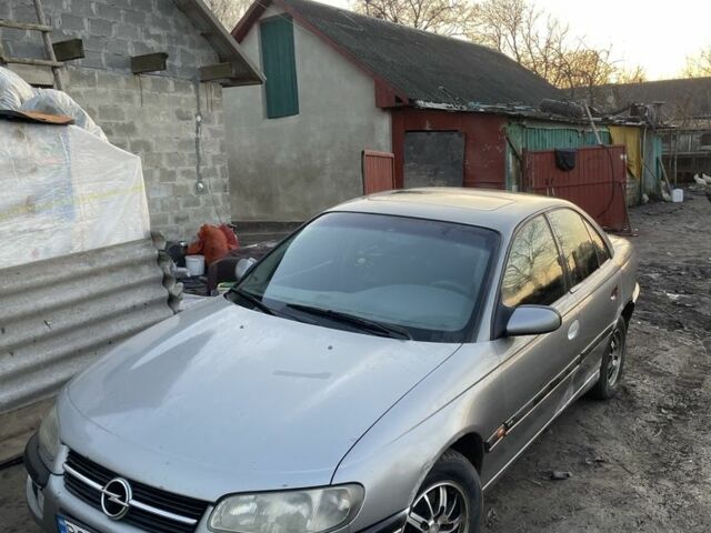 Серый Опель Омега, объемом двигателя 2.5 л и пробегом 300 тыс. км за 1699 $, фото 1 на Automoto.ua