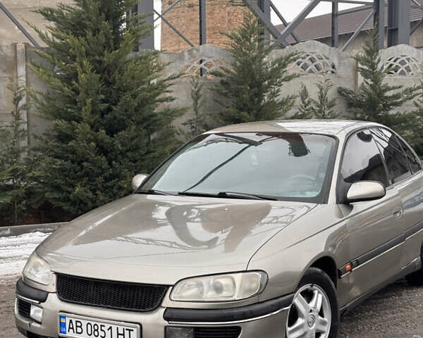 Серый Опель Омега, объемом двигателя 2 л и пробегом 300 тыс. км за 2500 $, фото 1 на Automoto.ua
