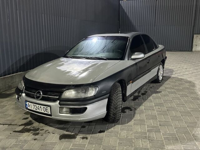 Сірий Опель Омега, об'ємом двигуна 2 л та пробігом 250 тис. км за 1200 $, фото 1 на Automoto.ua