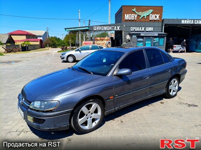 Серый Опель Омега, объемом двигателя 2.5 л и пробегом 446 тыс. км за 2800 $, фото 1 на Automoto.ua