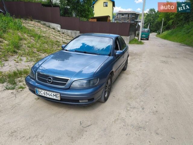 Серый Опель Омега, объемом двигателя 2.5 л и пробегом 406 тыс. км за 2100 $, фото 1 на Automoto.ua