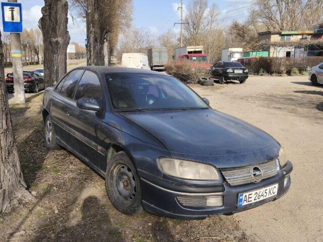 Серый Опель Омега, объемом двигателя 2 л и пробегом 300 тыс. км за 700 $, фото 1 на Automoto.ua