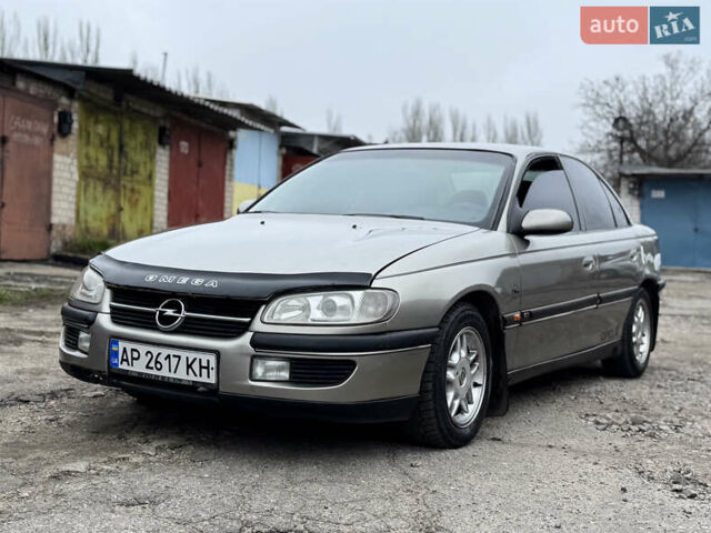 Серый Опель Омега, объемом двигателя 2 л и пробегом 297 тыс. км за 1950 $, фото 1 на Automoto.ua
