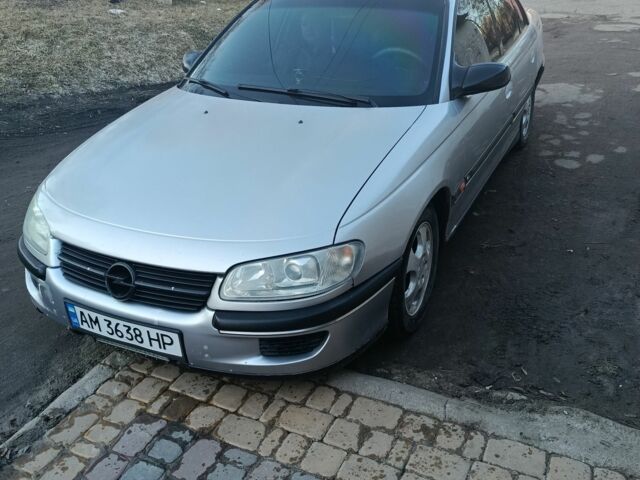 Серый Опель Омега, объемом двигателя 2 л и пробегом 256 тыс. км за 1900 $, фото 1 на Automoto.ua