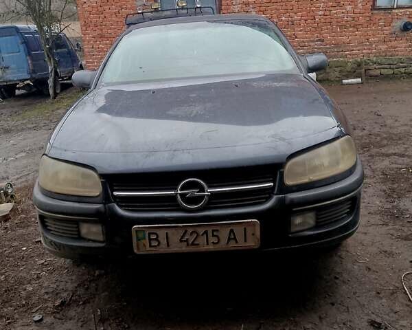 Серый Опель Омега, объемом двигателя 2.5 л и пробегом 100 тыс. км за 700 $, фото 1 на Automoto.ua