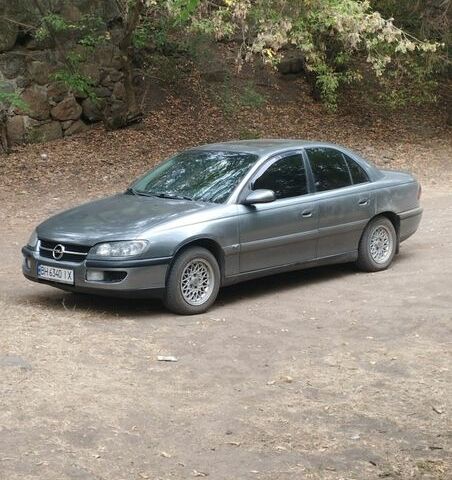 Серый Опель Омега, объемом двигателя 2 л и пробегом 350 тыс. км за 2300 $, фото 1 на Automoto.ua