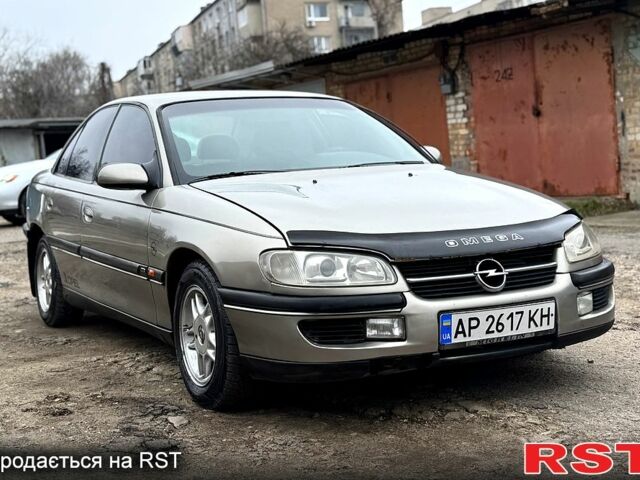 Сірий Опель Омега, об'ємом двигуна 2 л та пробігом 297 тис. км за 1950 $, фото 1 на Automoto.ua