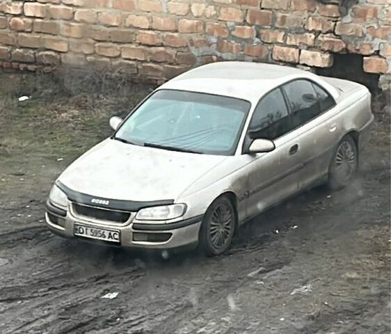 Сірий Опель Омега, об'ємом двигуна 2 л та пробігом 247 тис. км за 1500 $, фото 1 на Automoto.ua