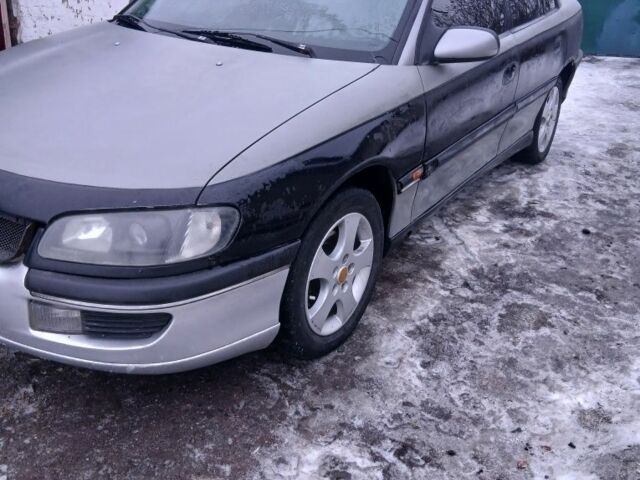 Серый Опель Омега, объемом двигателя 2 л и пробегом 100 тыс. км за 1250 $, фото 1 на Automoto.ua