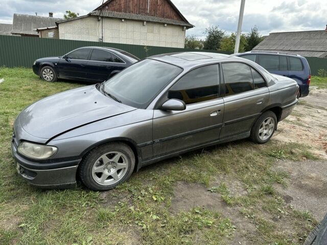 Серый Опель Омега, объемом двигателя 2.5 л и пробегом 300 тыс. км за 870 $, фото 1 на Automoto.ua