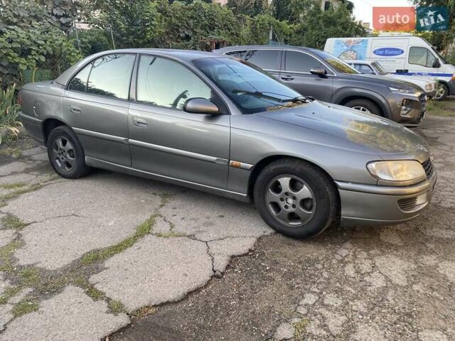 Сірий Опель Омега, об'ємом двигуна 2.5 л та пробігом 272 тис. км за 1600 $, фото 1 на Automoto.ua