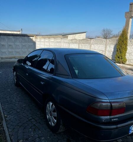 Серый Опель Омега, объемом двигателя 2 л и пробегом 315 тыс. км за 2100 $, фото 1 на Automoto.ua