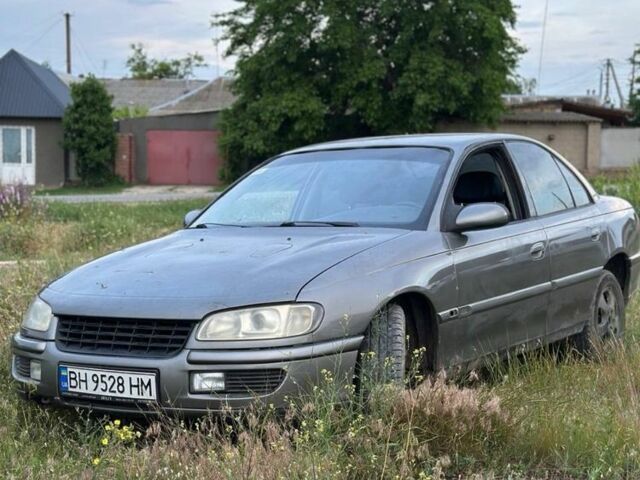Сірий Опель Омега, об'ємом двигуна 2.5 л та пробігом 270 тис. км за 1600 $, фото 1 на Automoto.ua