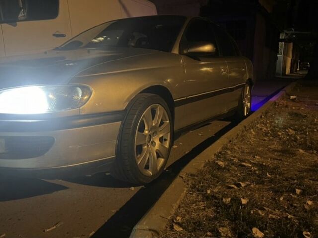 Сірий Опель Омега, об'ємом двигуна 2 л та пробігом 395 тис. км за 800 $, фото 1 на Automoto.ua