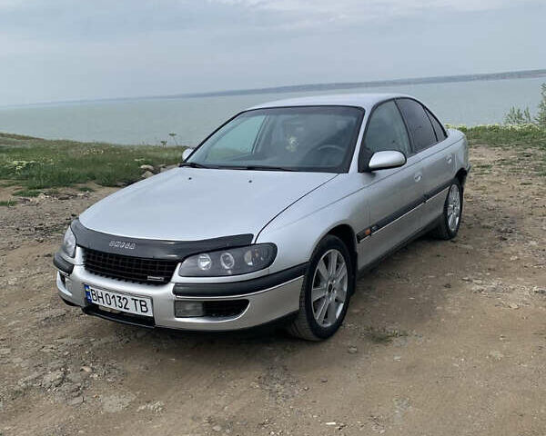 Серый Опель Омега, объемом двигателя 2.5 л и пробегом 383 тыс. км за 3199 $, фото 1 на Automoto.ua