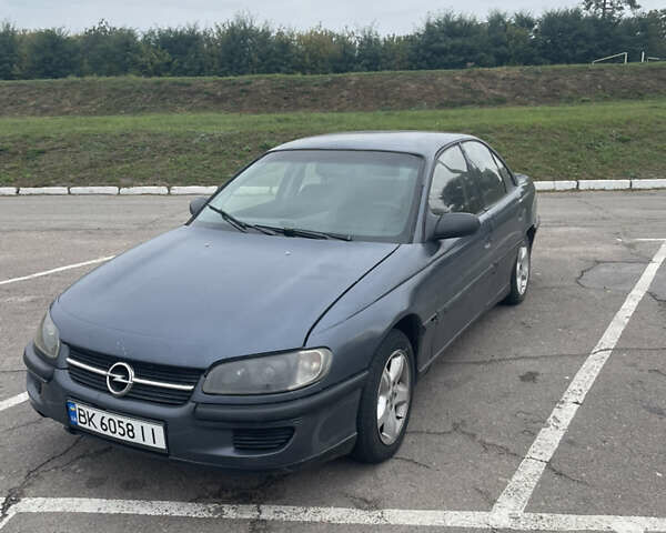 Сірий Опель Омега, об'ємом двигуна 2 л та пробігом 300 тис. км за 1800 $, фото 1 на Automoto.ua