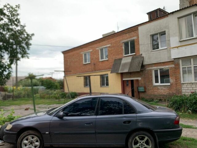 Серый Опель Омега, объемом двигателя 3 л и пробегом 400 тыс. км за 500 $, фото 1 на Automoto.ua