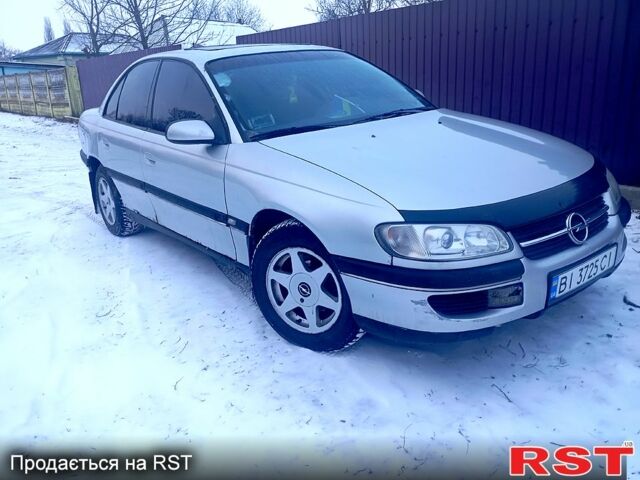 Сірий Опель Омега, об'ємом двигуна 2 л та пробігом 0 тис. км за 1271 $, фото 1 на Automoto.ua