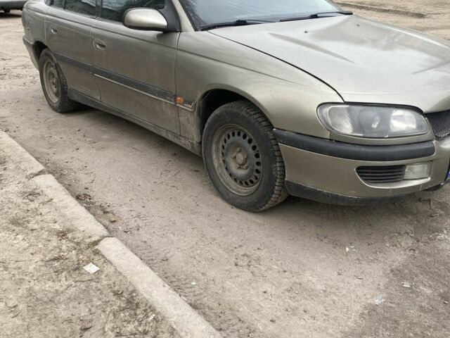 Сірий Опель Омега, об'ємом двигуна 2.5 л та пробігом 300 тис. км за 1500 $, фото 1 на Automoto.ua