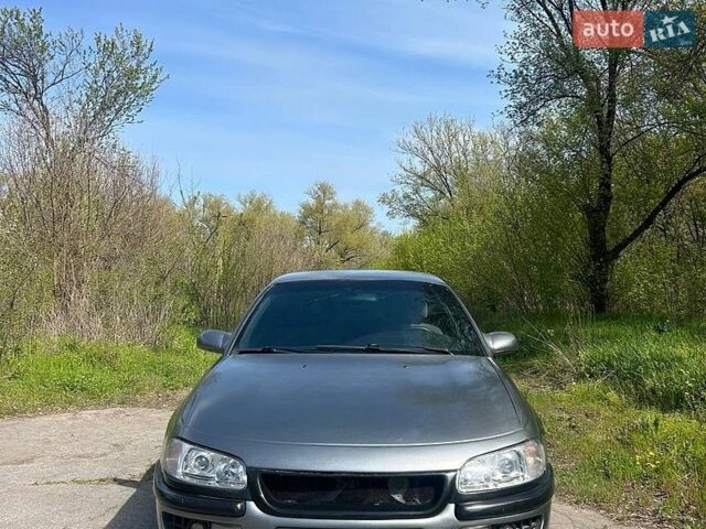 Серый Опель Омега, объемом двигателя 2 л и пробегом 233 тыс. км за 3400 $, фото 1 на Automoto.ua