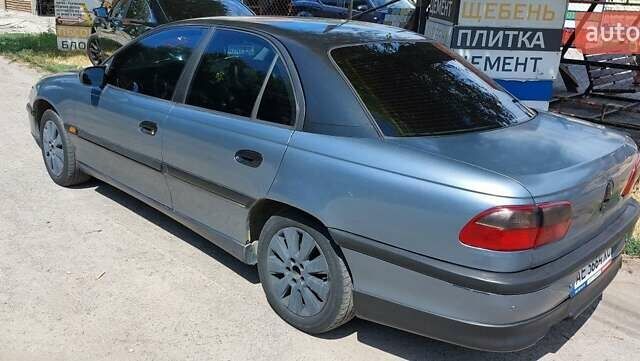 Сірий Опель Омега, об'ємом двигуна 3 л та пробігом 350 тис. км за 2000 $, фото 1 на Automoto.ua