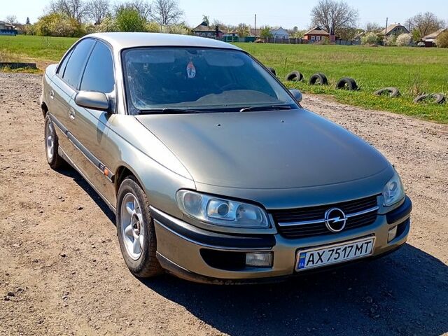 Сірий Опель Омега, об'ємом двигуна 2 л та пробігом 300 тис. км за 2600 $, фото 1 на Automoto.ua