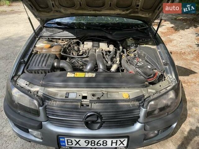 Серый Опель Омега, объемом двигателя 2.5 л и пробегом 287 тыс. км за 1900 $, фото 1 на Automoto.ua